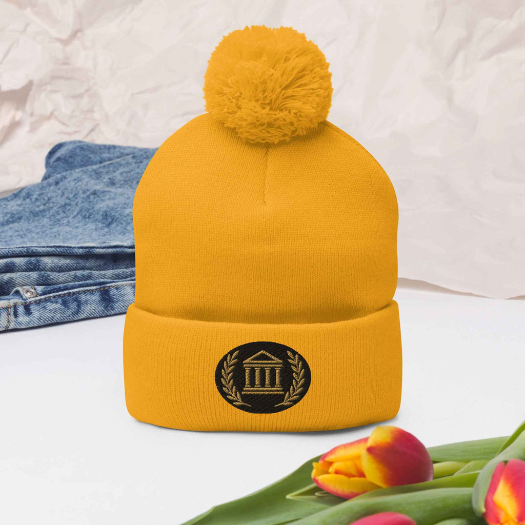 Bonnet à pompon marque Élégance-Empire-Agency.