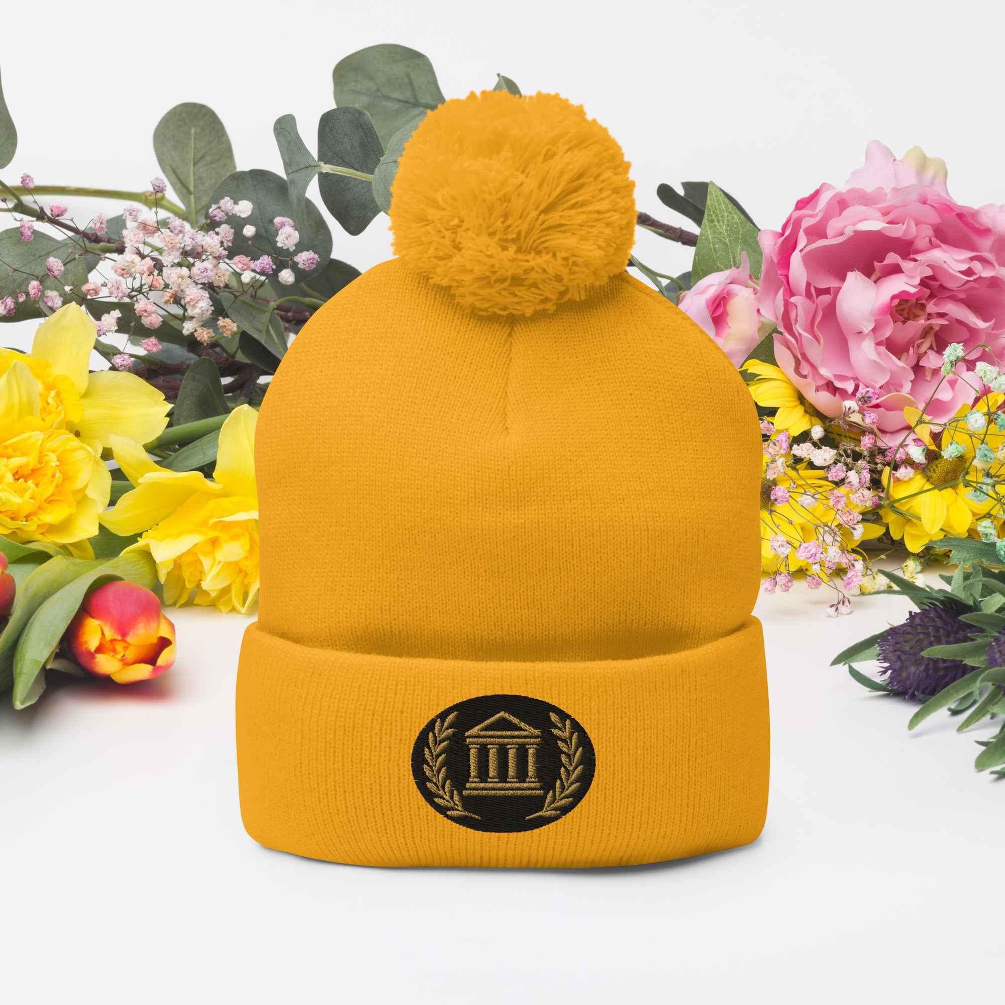 Bonnet à pompon marque Élégance-Empire-Agency.